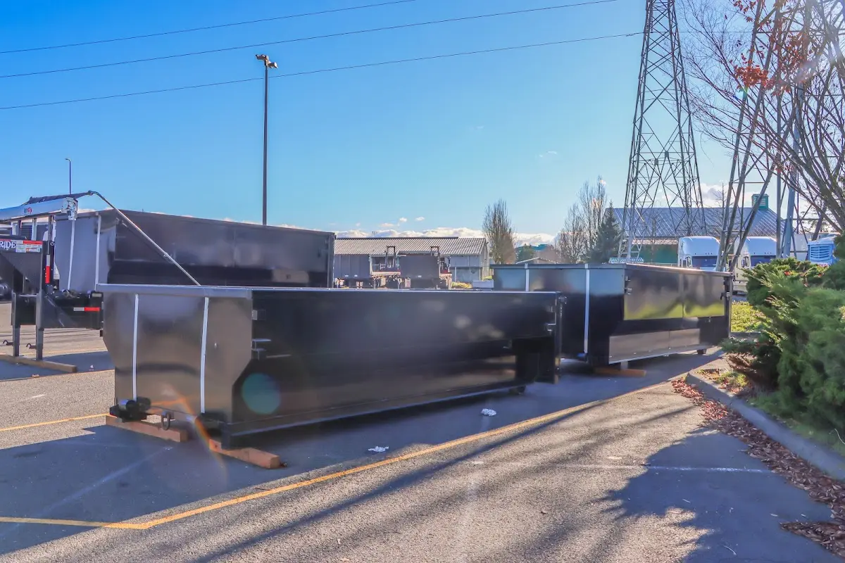 Roll-off dumpster ready for waste disposal at job site for 20 Yard Dumpster Rental in Bellefontaine